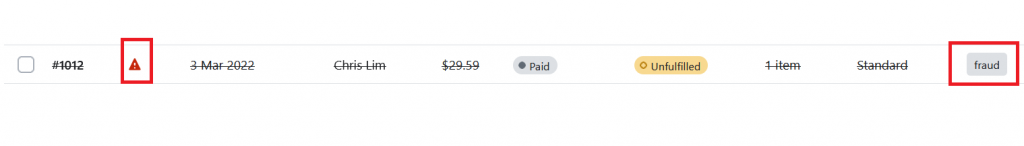 Shopify order with a fraud risk icon